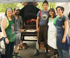 With the pizza oven